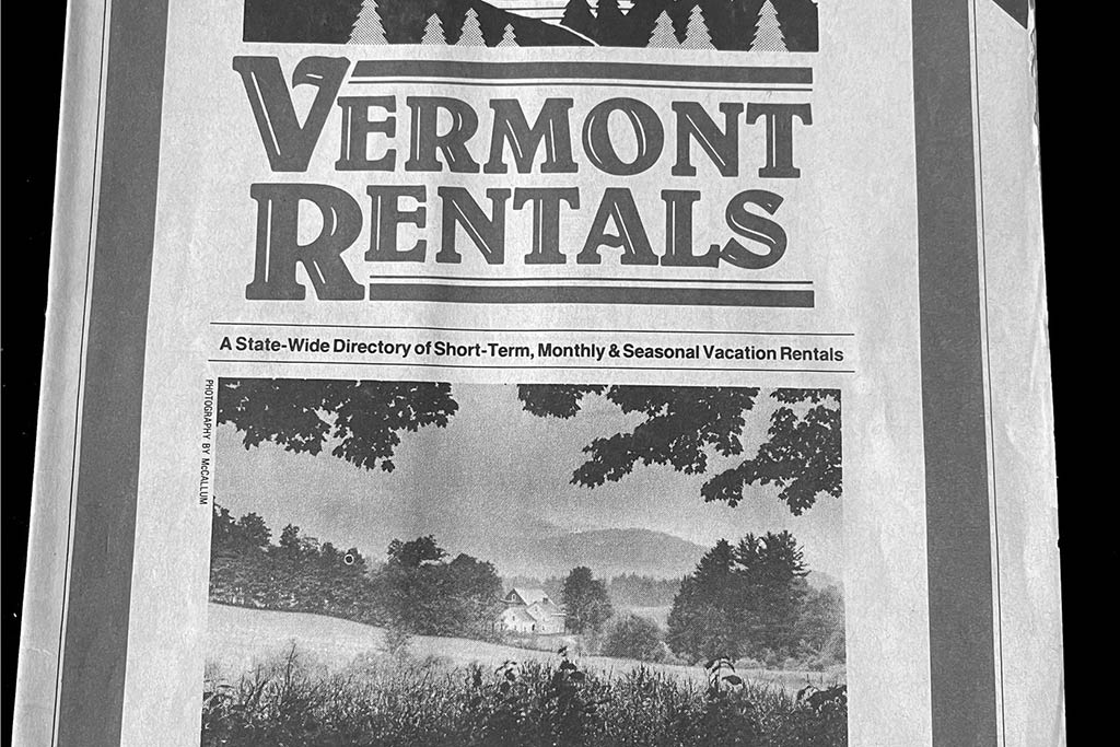 An old newspaper with an article about vacation rentals