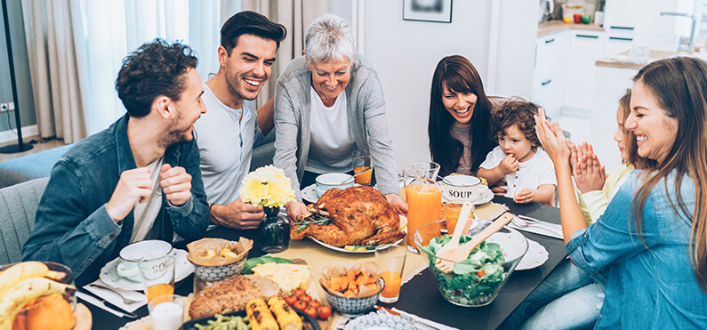 A happy family at the Thanksgiving table